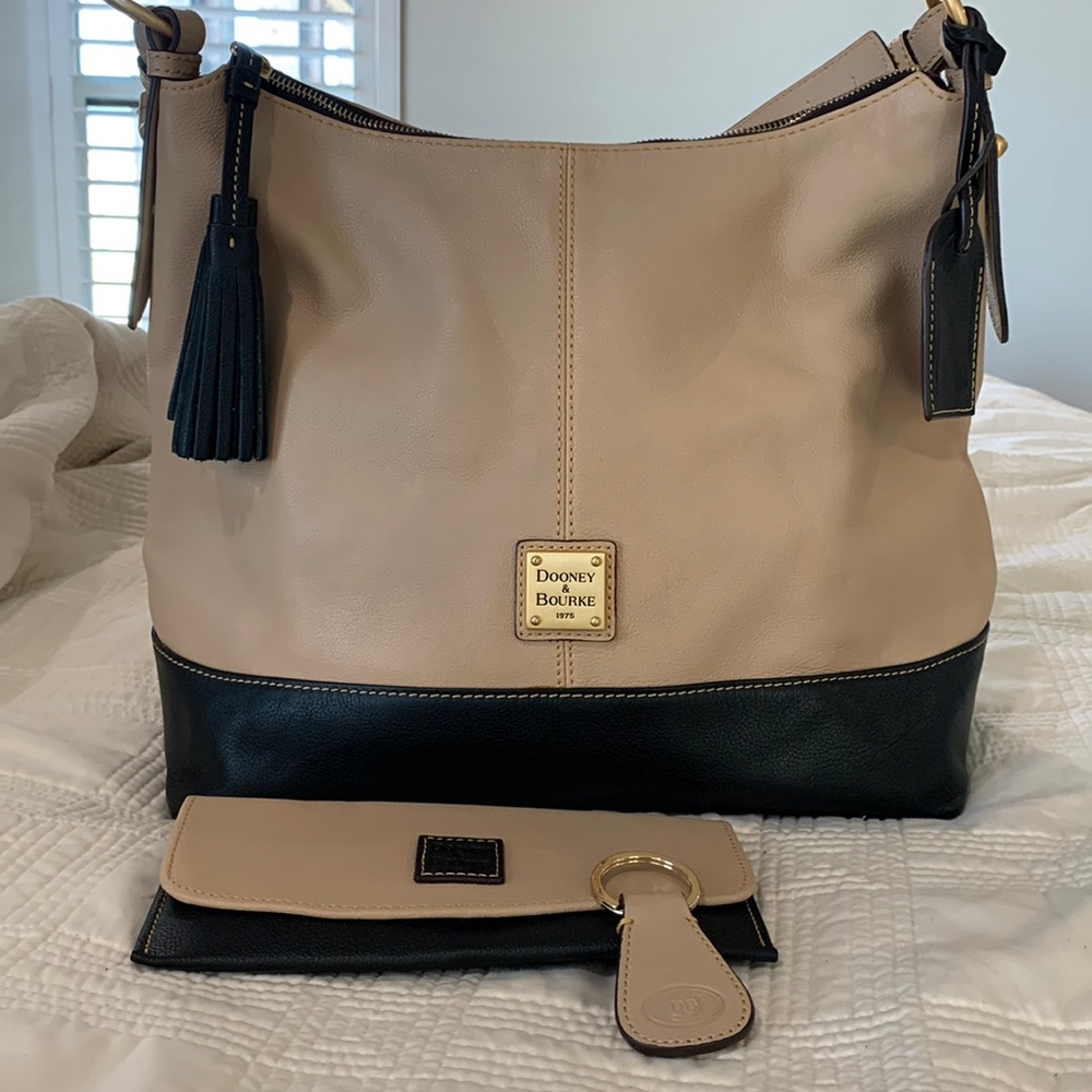 Black and tan Dooney & Bourke shoulder bag